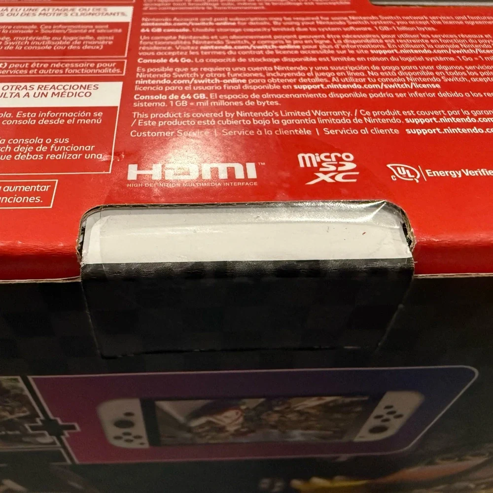 Nintendo Switch OLED with White Joy-Con and Mario Kart 8 Deluxe